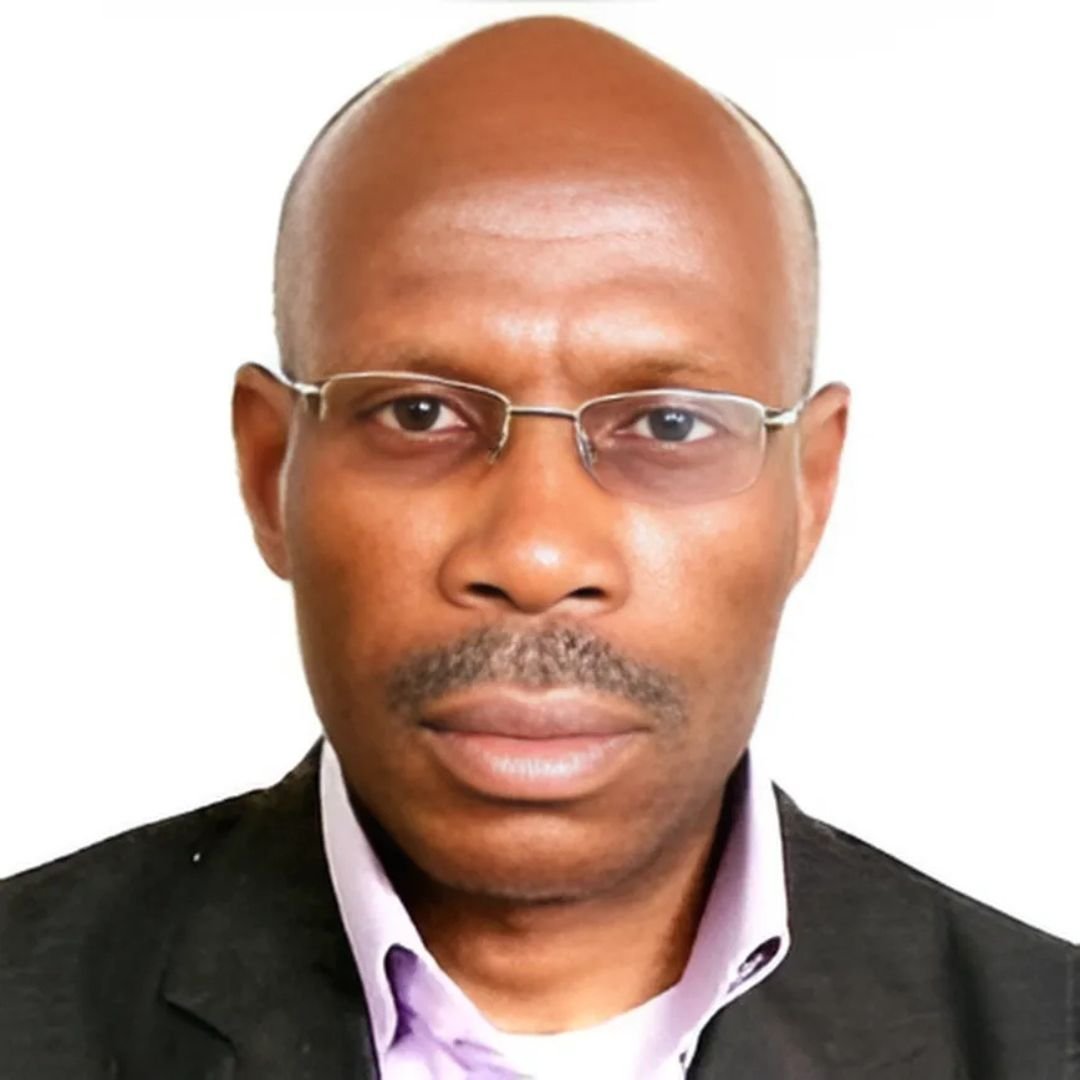 Dr Mike Koku