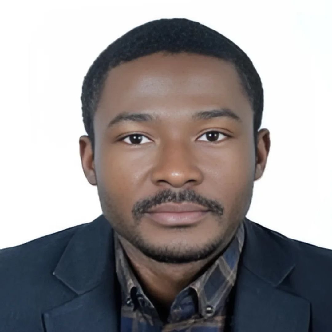 Dr Mike Koku