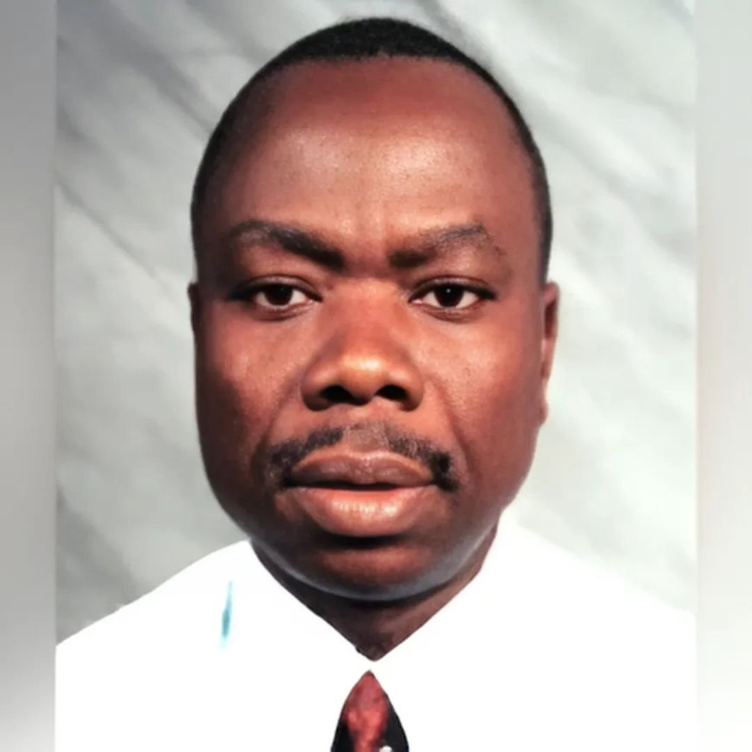 Dr Mike Koku