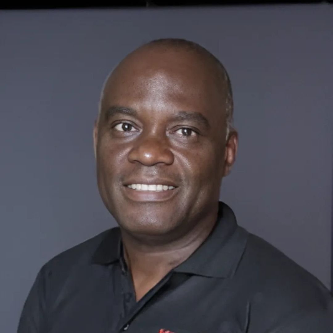 Dr Mike Koku