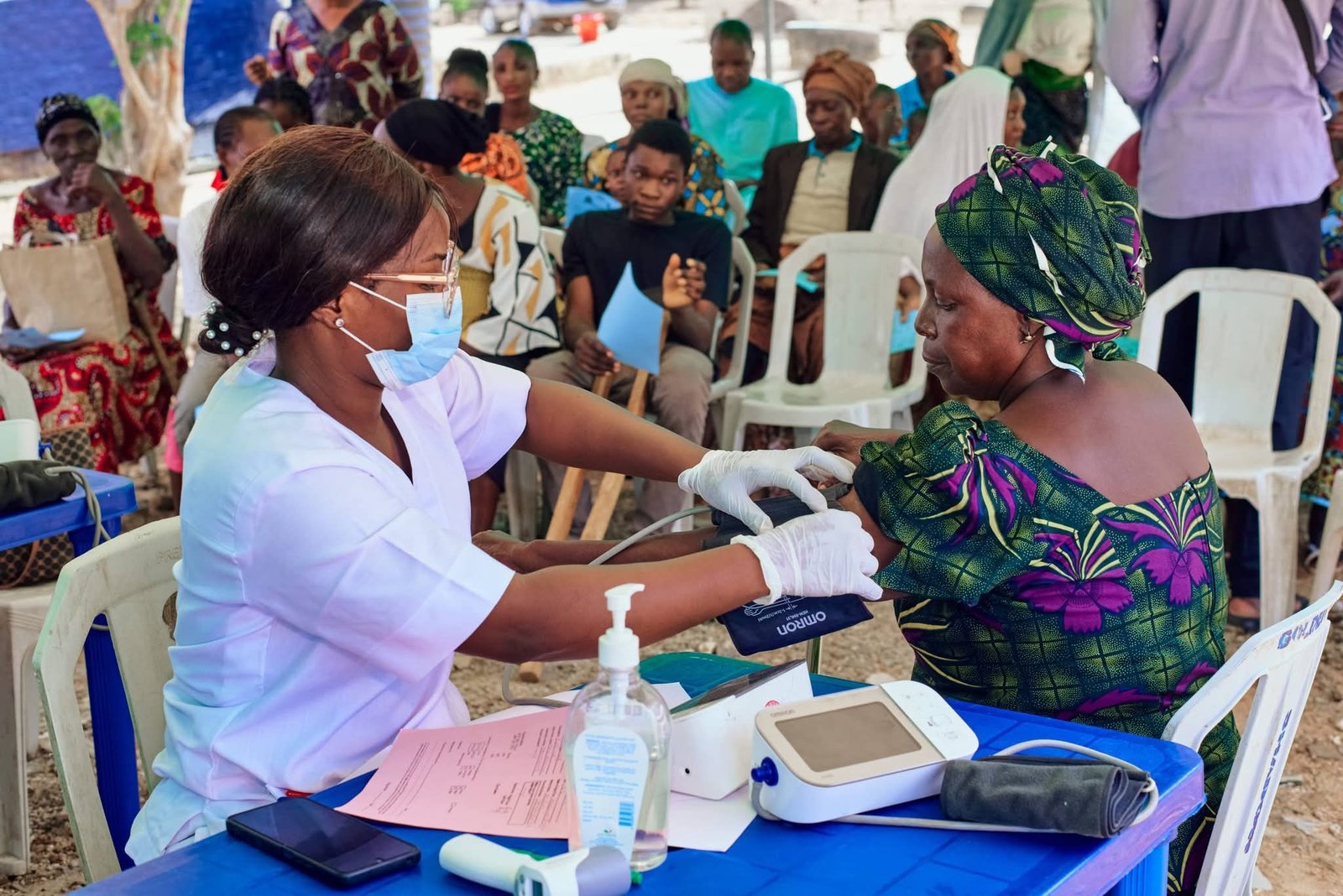 A clinician checks a participant’s blood pressure during the outreach.