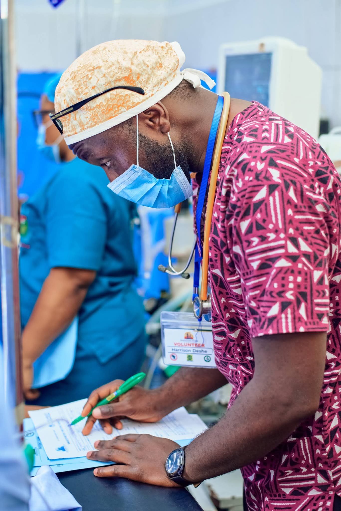 Volunteer clinician in a medical outreach setting.